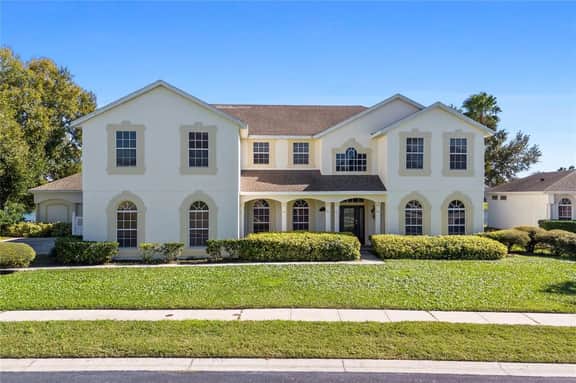 BRAND NEW! Lakefront 9BR Pool Hot Tub Outdoor Kitchen BBQ Theater 2 miles Disney