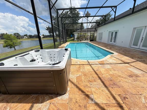 BRAND NEW! Lakefront 9BR Pool Hot Tub Outdoor Kitchen BBQ Theater 2 miles Disney