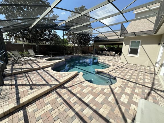 Luxurious Getaway Pool Hot Tub Theater Gym Outdoor Kitchen BBQ 2 Miles to Disney
