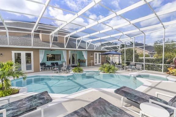 Luxurious 9BR Themed SE Facing Pool Hot Tub Theater Game Room BBQ 2 miles Disney